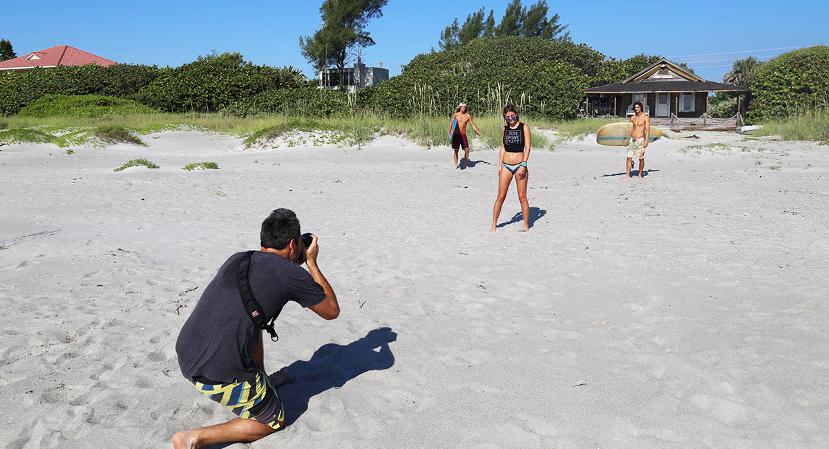 Photographer Zach Ashton shooting on the beach at Driftwood