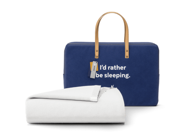 Nolah Bamboo Weighted Blanket and bag saying "I'd Rather Be Sleeping"