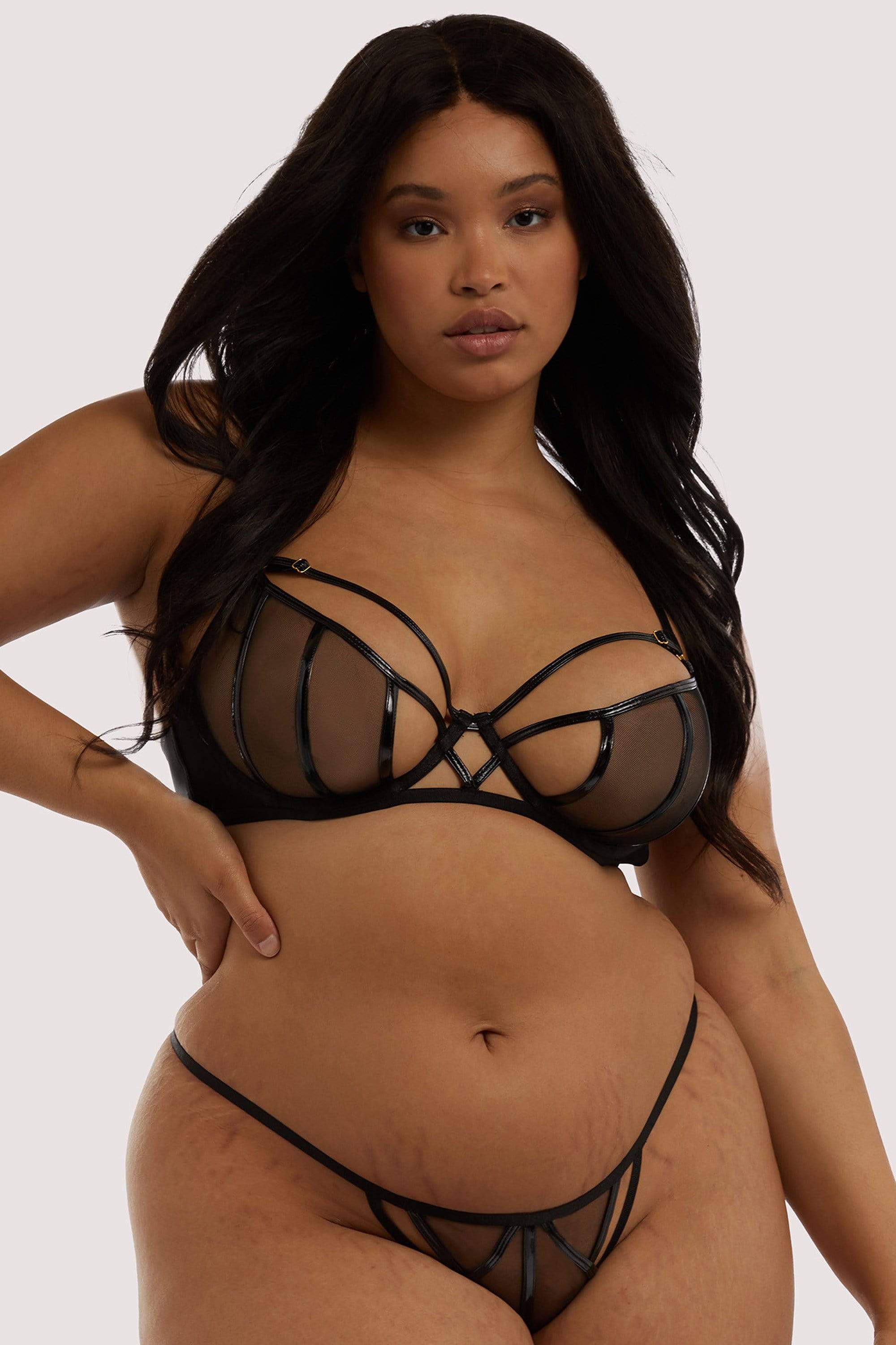 https://cdn.shopify.com/s/files/1/1078/7264/products/hustler-bra-hustler-kelly-black-pvc-panelled-bra-28940745867312.jpg?v=1633513387