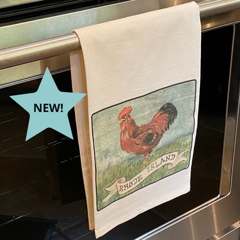 tea-towel-with-design-of-Rhode-Island-state-bird-hanging-on-kitchen-oven-door