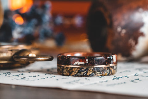 Custom Rustic & Main Wedding band. Top inlay made of wooden from customer's heirloom smoking pipe, the second inlay is gold from a family wedding band, and the third inlay is lavender petals from the bride's bouquet