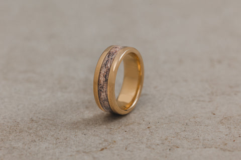 solid-yellow-gold-band-inlayed-with-naturally-shed-elk-antler-The-Marksman-in-yellow-gold