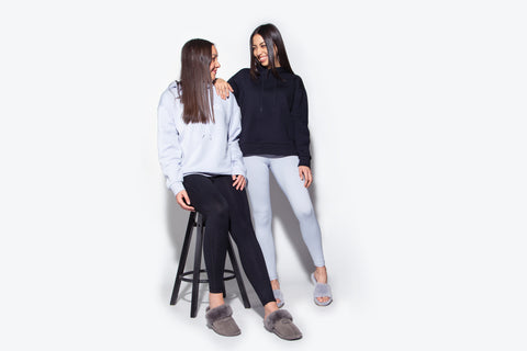 2 women laughing wearing comfort leisure clothing