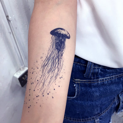 Jellyfish tattoo tattooed on the wrist, micro-realistic