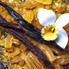 A photograph detail of golden resins, opulent flowers, and sweet vanilla