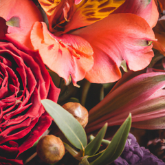 A photograph detail of a complex floral bouquet