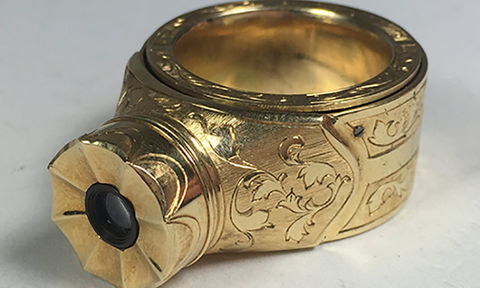 A gold hidden ring camera used by KGB spies during the cold war era