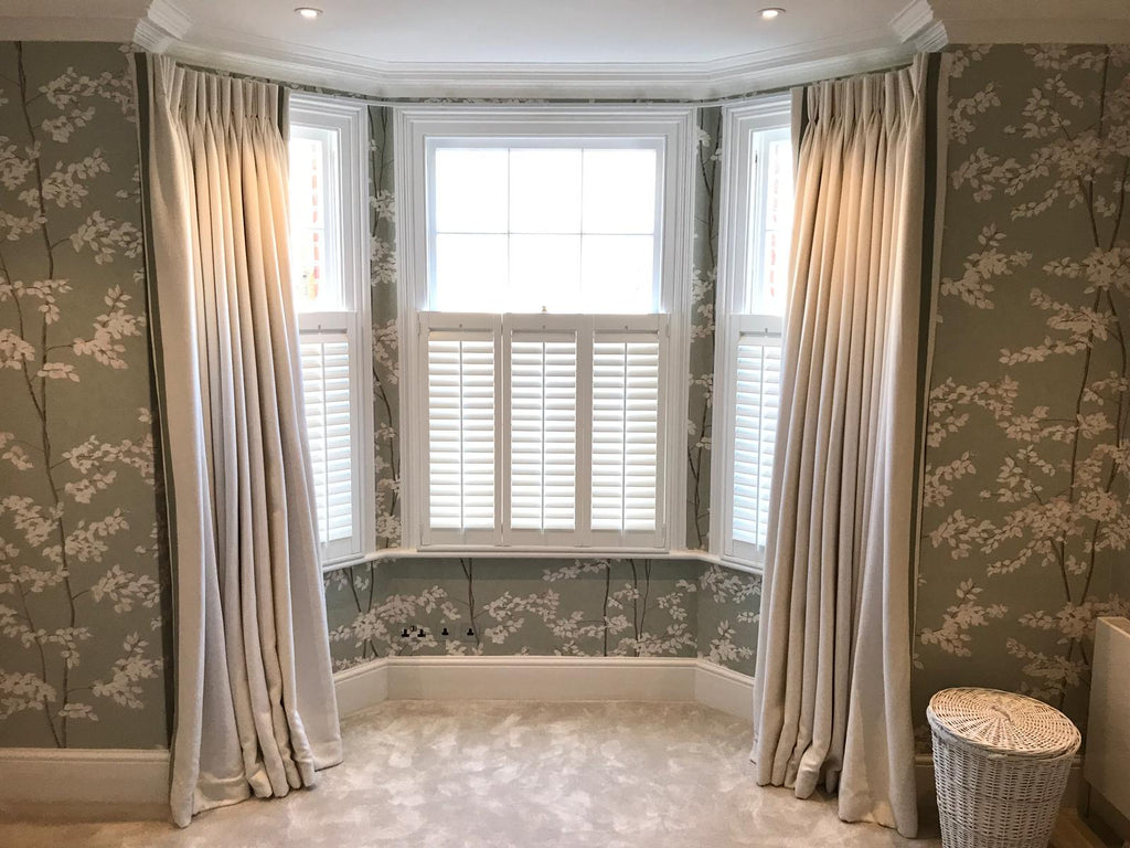 bay window with curtains cafe style shutters in Ealing Victorian conversion