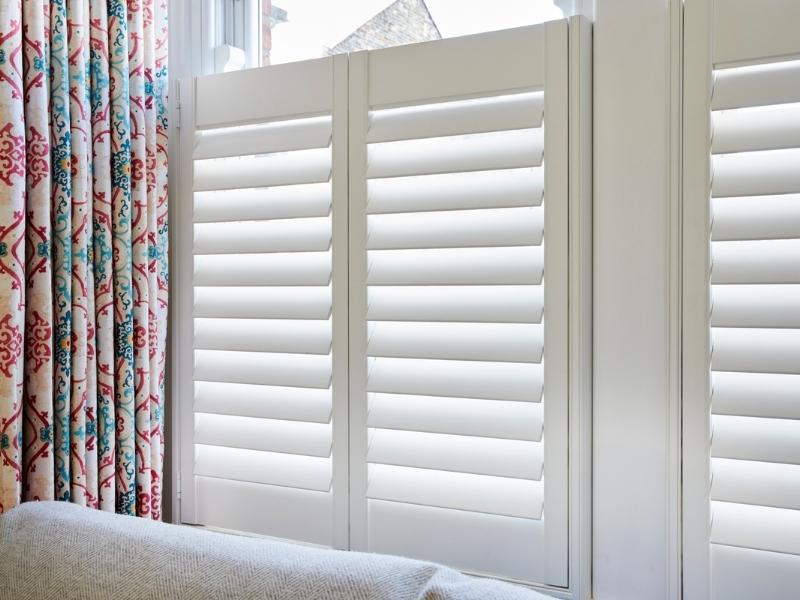 cafe style plantation shutters facing a main road