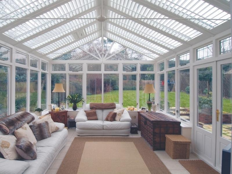 conservatory with shutters on the glass roof, which allow the amount of light enetring the conservatory and reduce the heat in the summer months, when kept closed