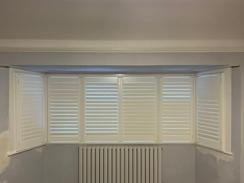 bay window with shutters refitted after the windows have been changed