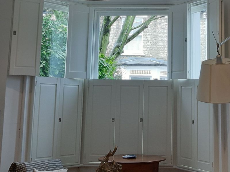 image shows how half closed solid shutters offer the benefit of increased privacy, when the bottom part is kept closed