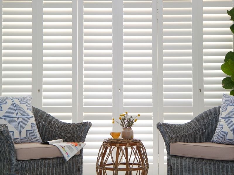 white aluminium shutters in a lounge