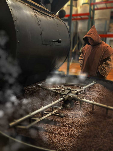 Wyoming Carmelite Monks watch a coffee roast of Mystic Monk Coffee.