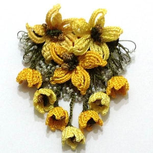 yellow brooch