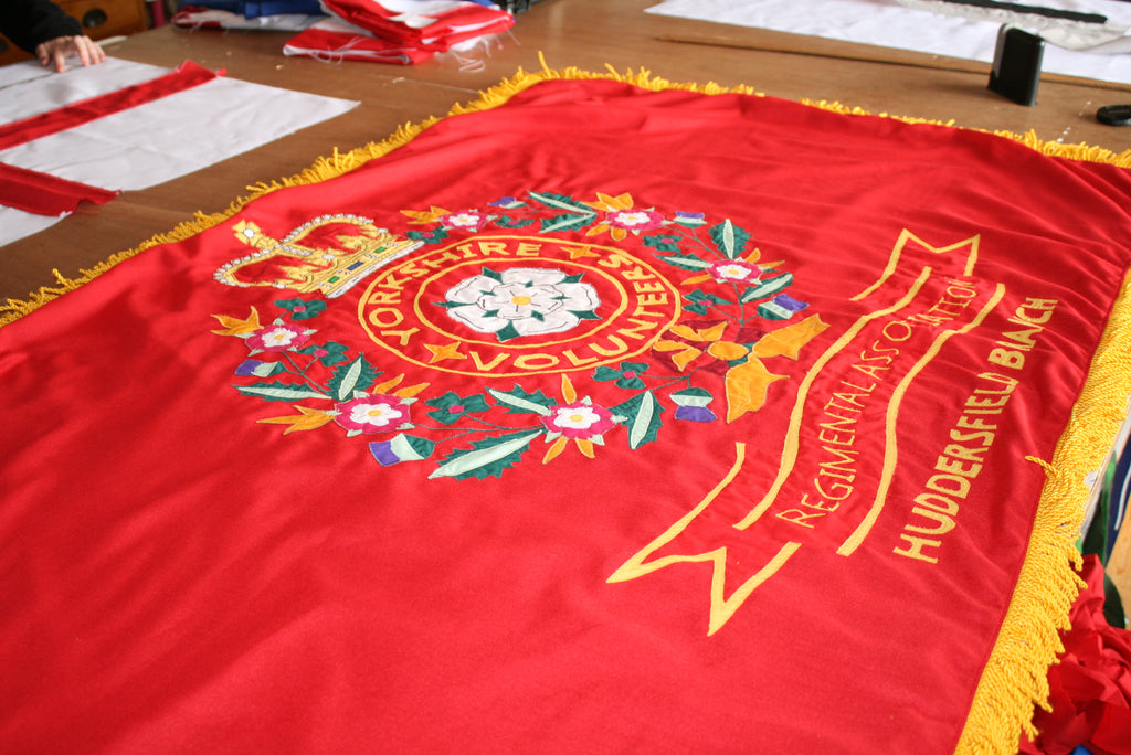 Stitched ceremonial flag with gold bullion fringe