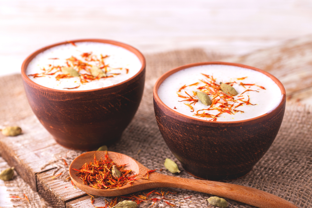 Spiced Lassi (Refreshing Yogurt Drink): A creamy and refreshing glass of Spiced Lassi, a yogurt-based drink flavored with aromatic spices like cardamom and cinnamon. (Perfect for a cool and flavorful hookah pairing!)