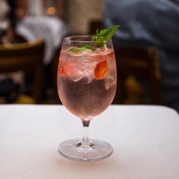 Rosa G&T cocktail – Boadicea Rosa Gin, elderflower tonic with fresh strawberries and mint sprig