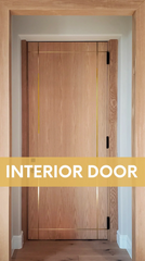A wooden interior door supported by three Waterson hinges.