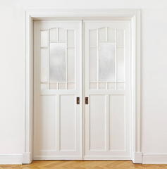 White double pocket doors with small frosted windows