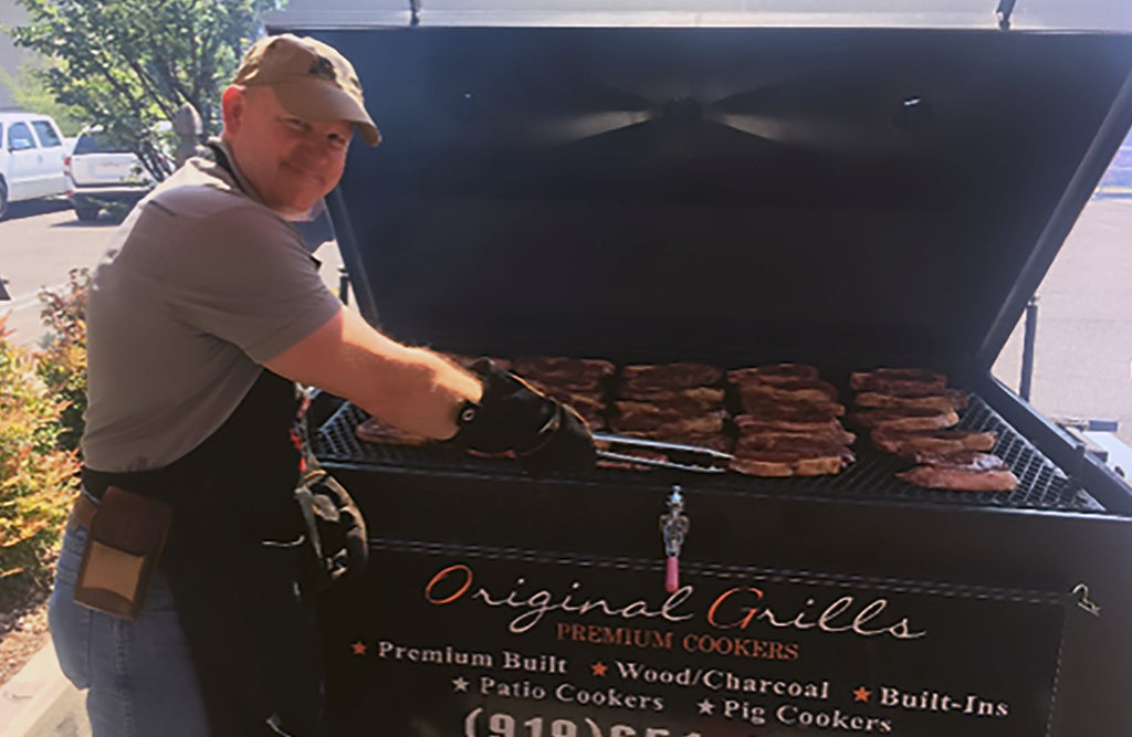 Allen Williams grilling Joyce Farms Aberdeen Angus steaks