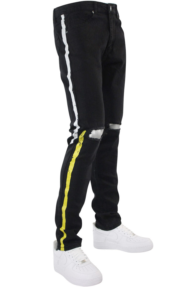 black track pants with yellow stripe