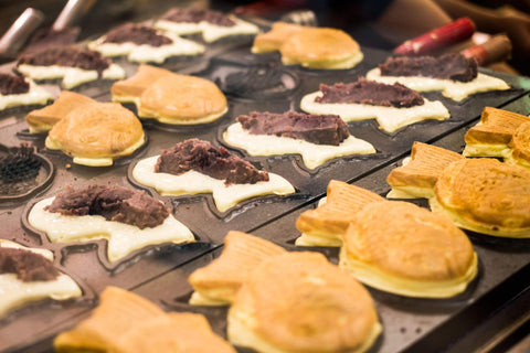 The fish-shaped cake is made from a batter similar to a pancake or waffle batter