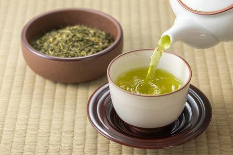 Healthy green tea being served in a cup