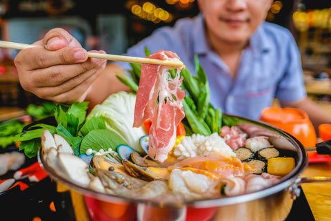 Enjoy eating Shabu Shabu and Sukiyaki in hot pot at japanese restaurant