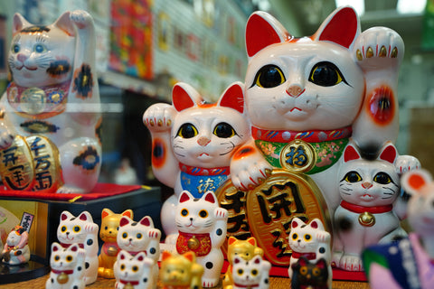 Japanese fortune cat animal doll called Manekineko at Kappabashi, Tokyo, Japan