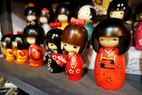 Japanese wooden kokeshi dolls in Kimono suit