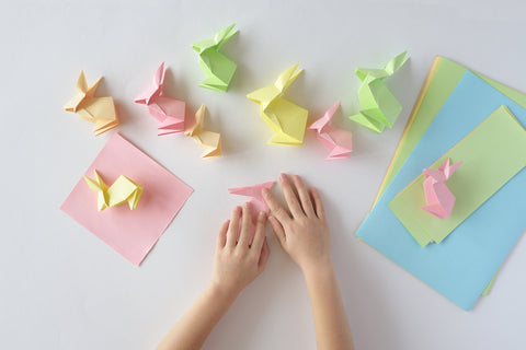 Lesson of origami. Easter rabbits from paper in Japan