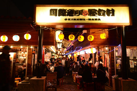 Night view of Japanese food stalls at 'Yataimura' in kokusai dori ,naha