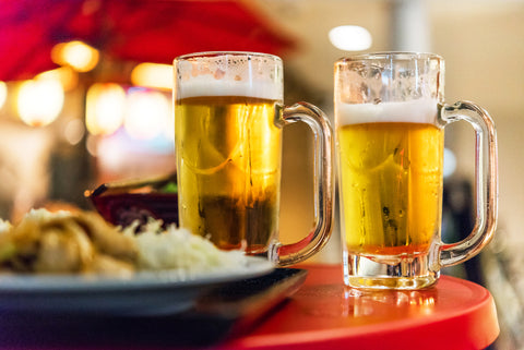 Two glasses with beer on the table, Tokyo, Japan. Close-up