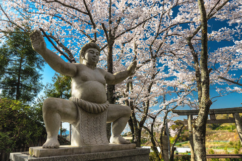 Historical Japanese Sumo shrine statue located in the Yamanobe no Michi trail in the Kansai province, Japan