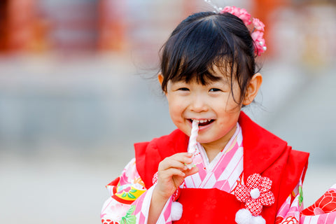 A girl enjoying Chitose-Ame