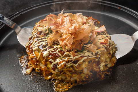 Japanese Traditional Pizza Okonomiyaki, popular street food snack