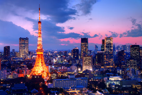 Tokyo Tower in Tokyo with many light bulbs, Japan at dusk.