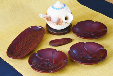 apanese traditional crafts. Lacquered teacup saucers / Called "Kamakurabori" in Japan.