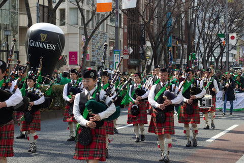 Photo of People Wearing Traditional Irish Uniforms in St Patrick's Day Parade at Harajuku, Tokyo. Japan.