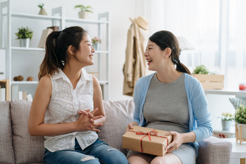 Japanese women exchanging gifts.