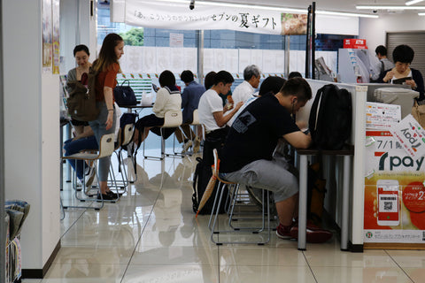 View of the cafe area inside a 7-Eleven in Tokyo's Ichigaya area