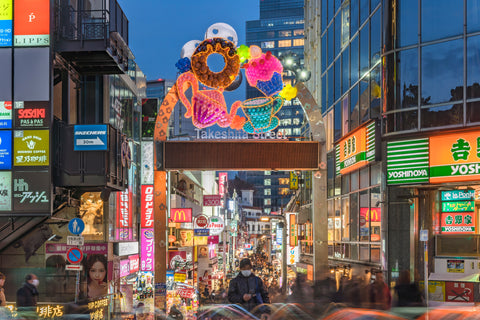 Night view of portal decorated with colorful inflatable balloons at the entrance to Takeshita Street,
