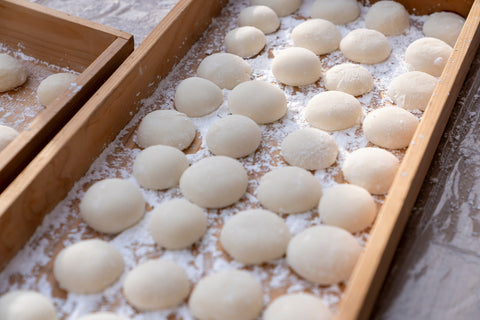 Mochi is a lovely aesthetically pleasing snack to look at: a smooth, round, white bun-shaped snack.