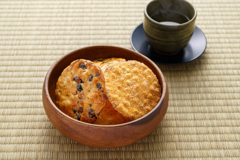 Japanese rice crackers and hot Japanese tea