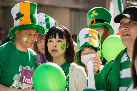 People attends the parade for St. Patrick's Day at Motomachi street in Yokohama, Japan