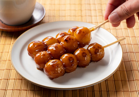 Dango is a chewy treat made from glutinous rice flour typically sold in the shape of a ball.