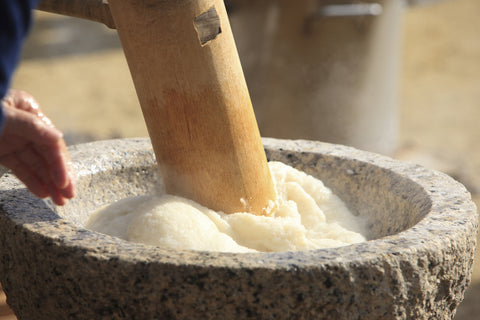 Mochi being pounded.