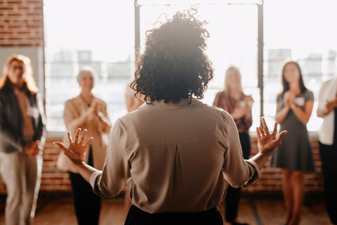 female empowering other colleagues in workplace