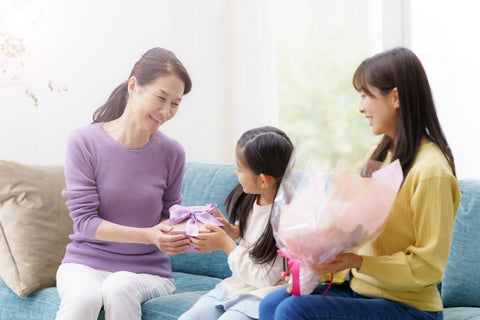 Japanese family giving gifts to each other.